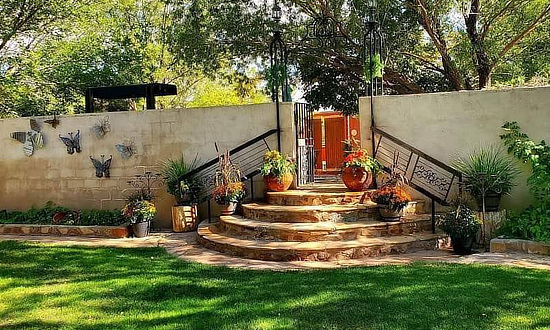 View of the gardens at The Heward House of Holbrook in Arizona