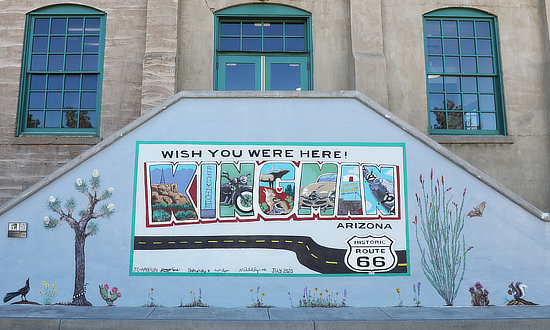 "Wish You Were Here" mural at the Powerhouse museum and visitor center in Kingman, Arizona, and Historic Route 66