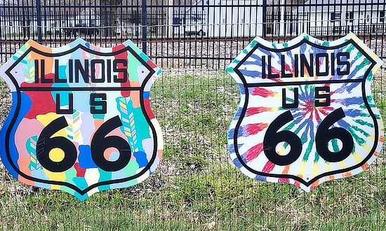 Colorful Route 66 shields on the fence at Perkins Wood and Glass ... "The Shop" ... on Route 66 in Gardner, Illinois