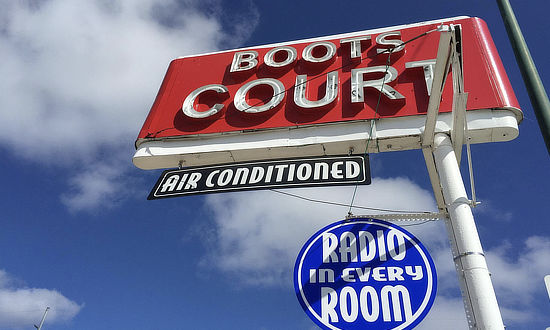 Sign at the Historic Boots Court, Route 66 Carthage, Missouri ... air conditioned, and a radio in every room