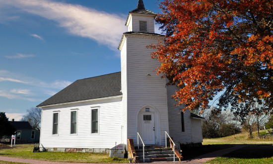 Vintage wooden church at Red Oak II, northeast of Carthage, Missouri Vintage wooden church at Red Oak II, northeast of Carthage, Missouri