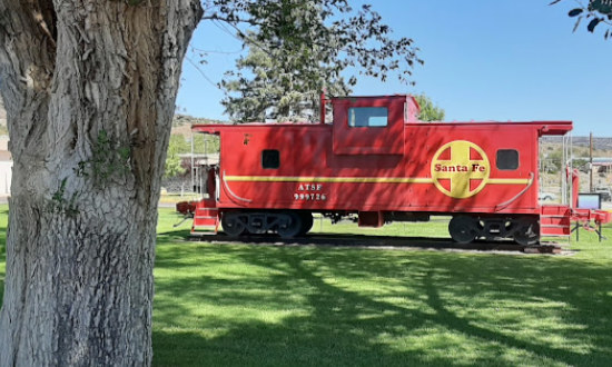 Santa Fe Railway Caboose in Grants, New Mexico in the park near the Route 66 arch