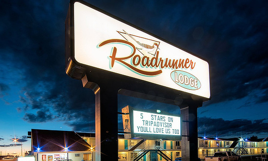 Sign at the Roadrunner Lodge Motel in Tucumcari, New Mexico, at night, on Historic Route 66 Sign at the Roadrunner Lodge Motel in Tucumcari, New Mexico, at night, on Historic Route 66