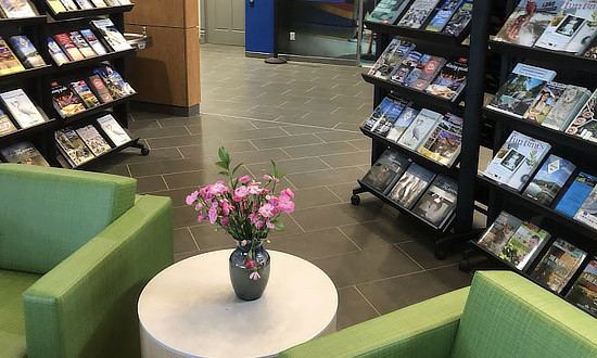 Sitting area and travel brochures at the Erick Tourism Information Center in Oklahoma