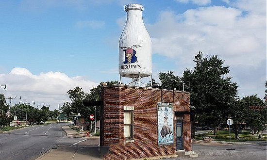 The Milk Bottle Grocery in Oklahoma City with the Braum's bottle on top