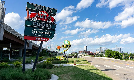 Tulsa Auto Court sign at the Cyrus Avery Southwest Plaza on the Arkansas River in Tulsa, Oklahoma