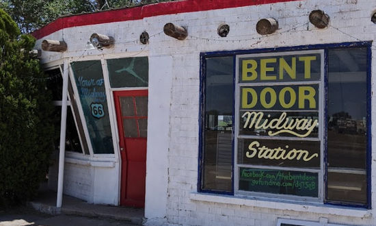 The famous red Bent Door at the Midway Station on Route 66 in Adrian, Texas