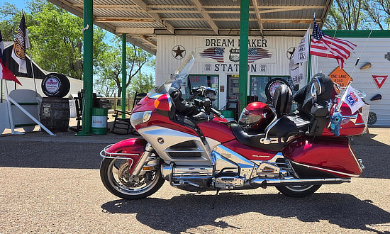 Motorcycle visitor at Dream Maker Station Route 66 Souvenir & Gift Shop in Adrian, Texas
