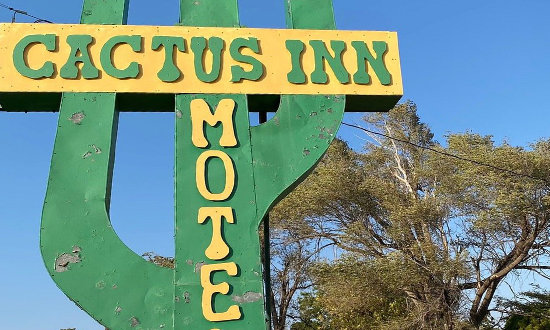 Sign at the Cactus Inn, 101 Pine Street in McLean, Texas